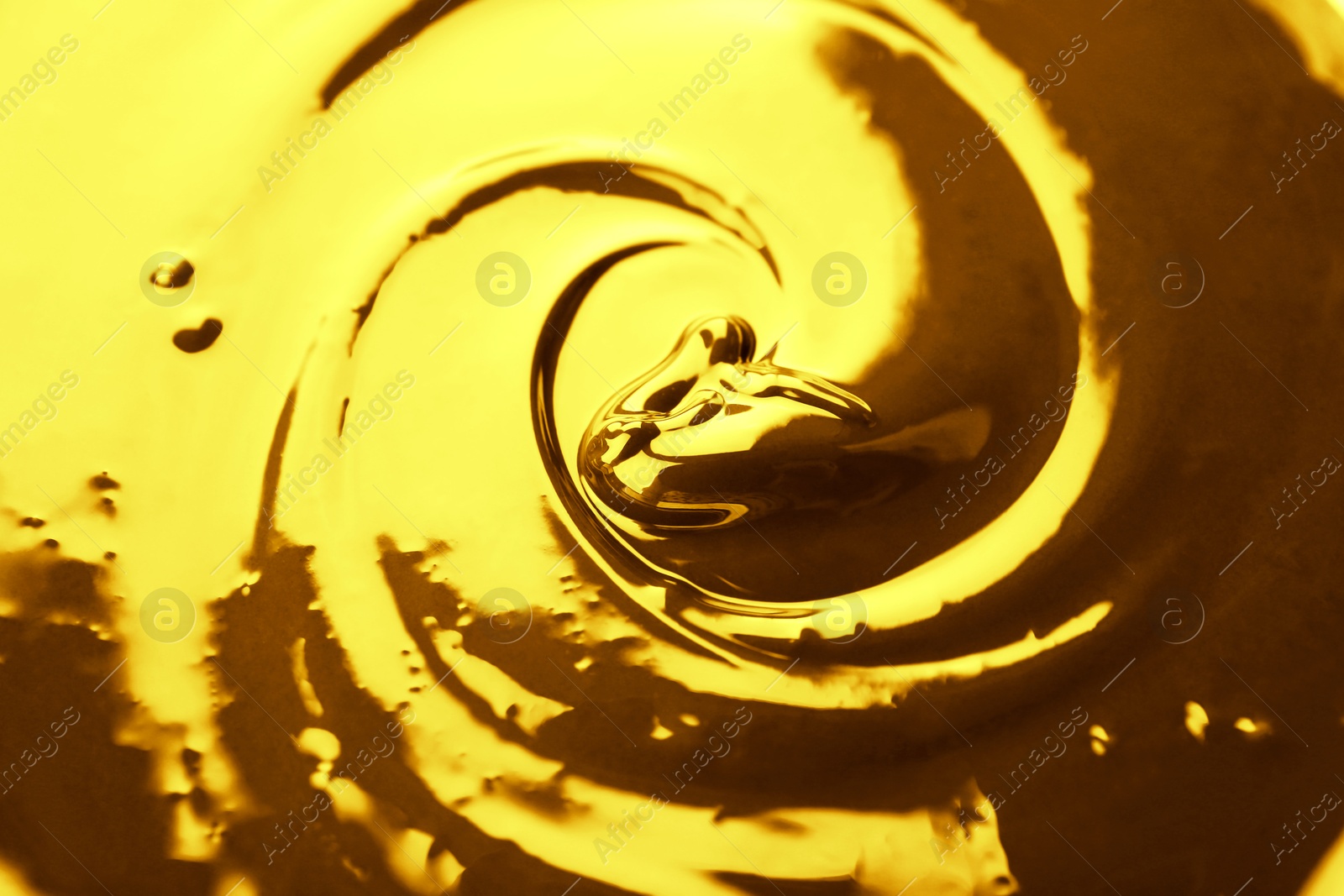 Image of Texture of gold fluid as background, closeup