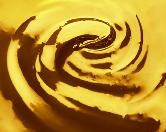 Image of Texture of gold fluid as background, closeup