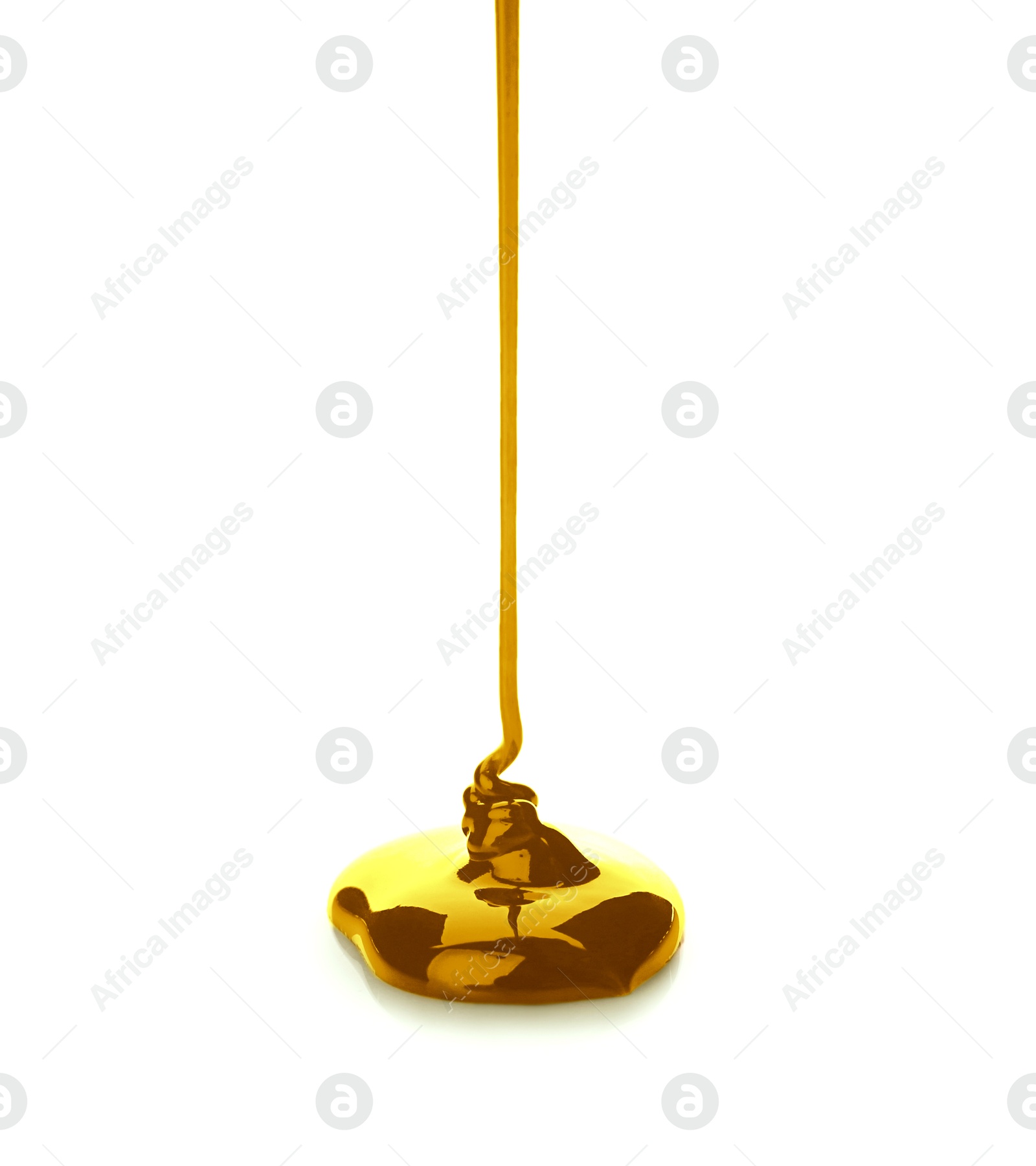 Image of Pouring gold fluid on white background. Bright liquid