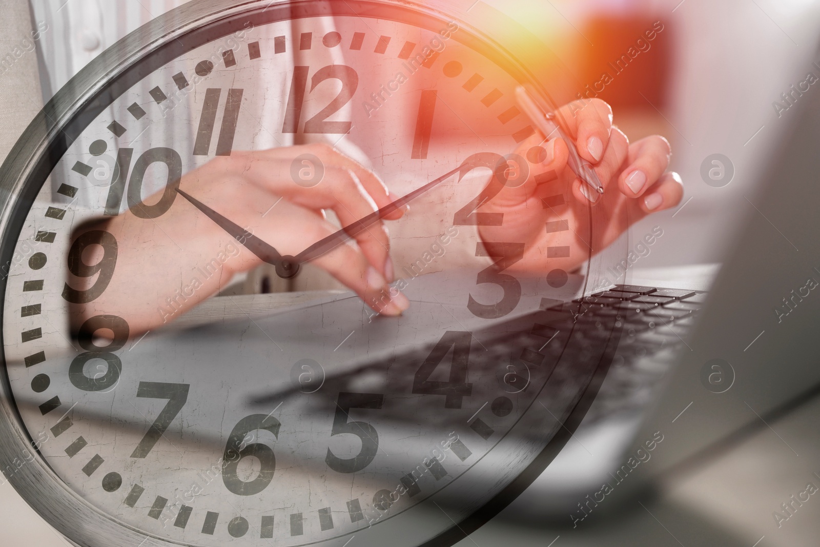 Image of Businesswoman working on laptop at table, clock, double exposure. Time management