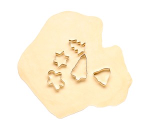 Photo of Raw dough and cookie cutters isolated on white, top view