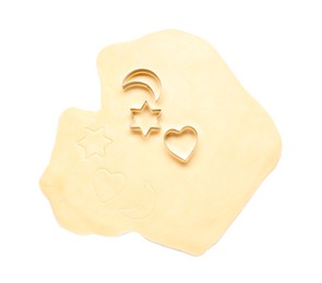 Raw dough and cookie cutters isolated on white, top view