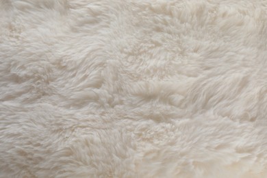 Photo of Texture of soft fabric as background, top view