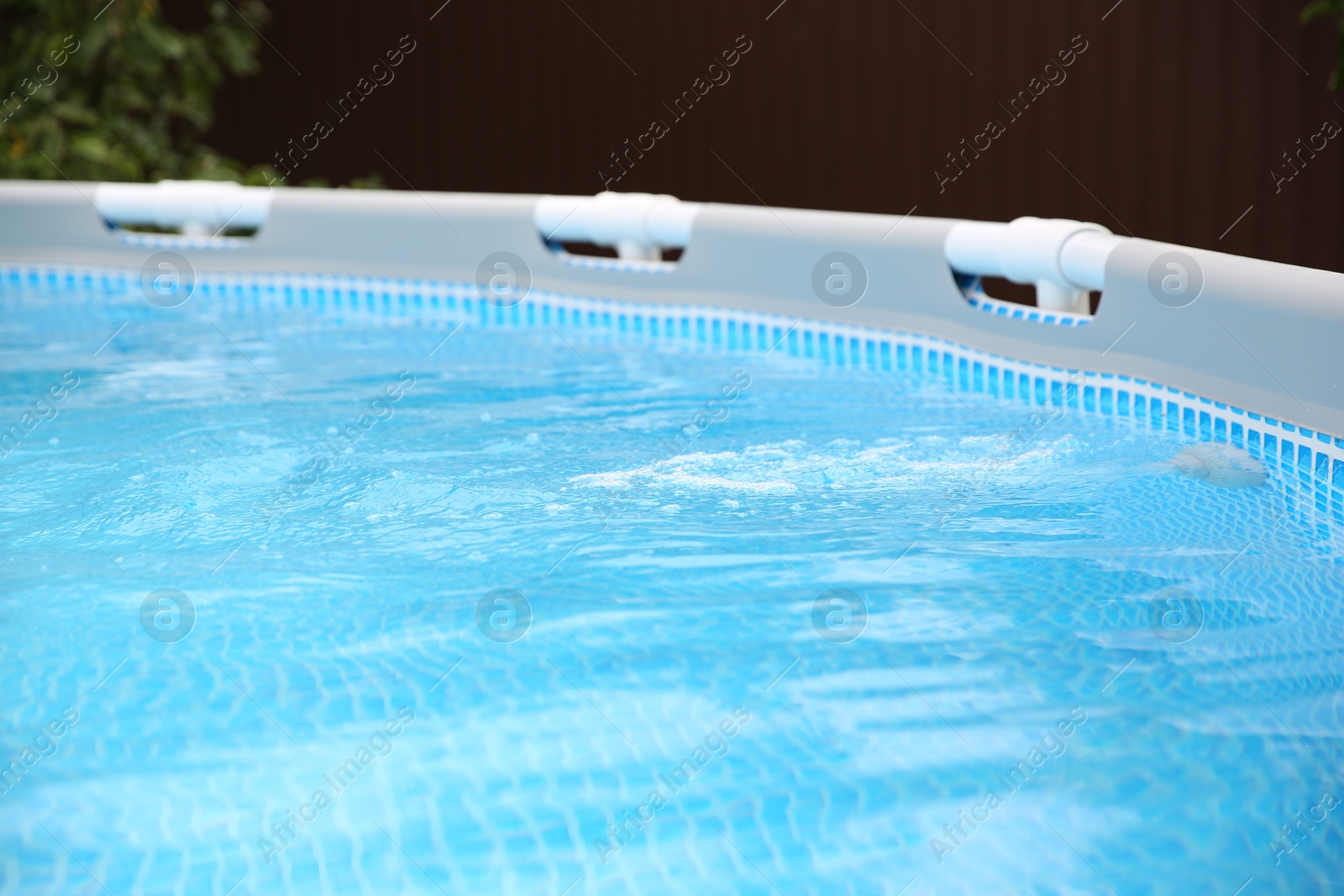 Photo of Above ground swimming pool with clear water outdoors