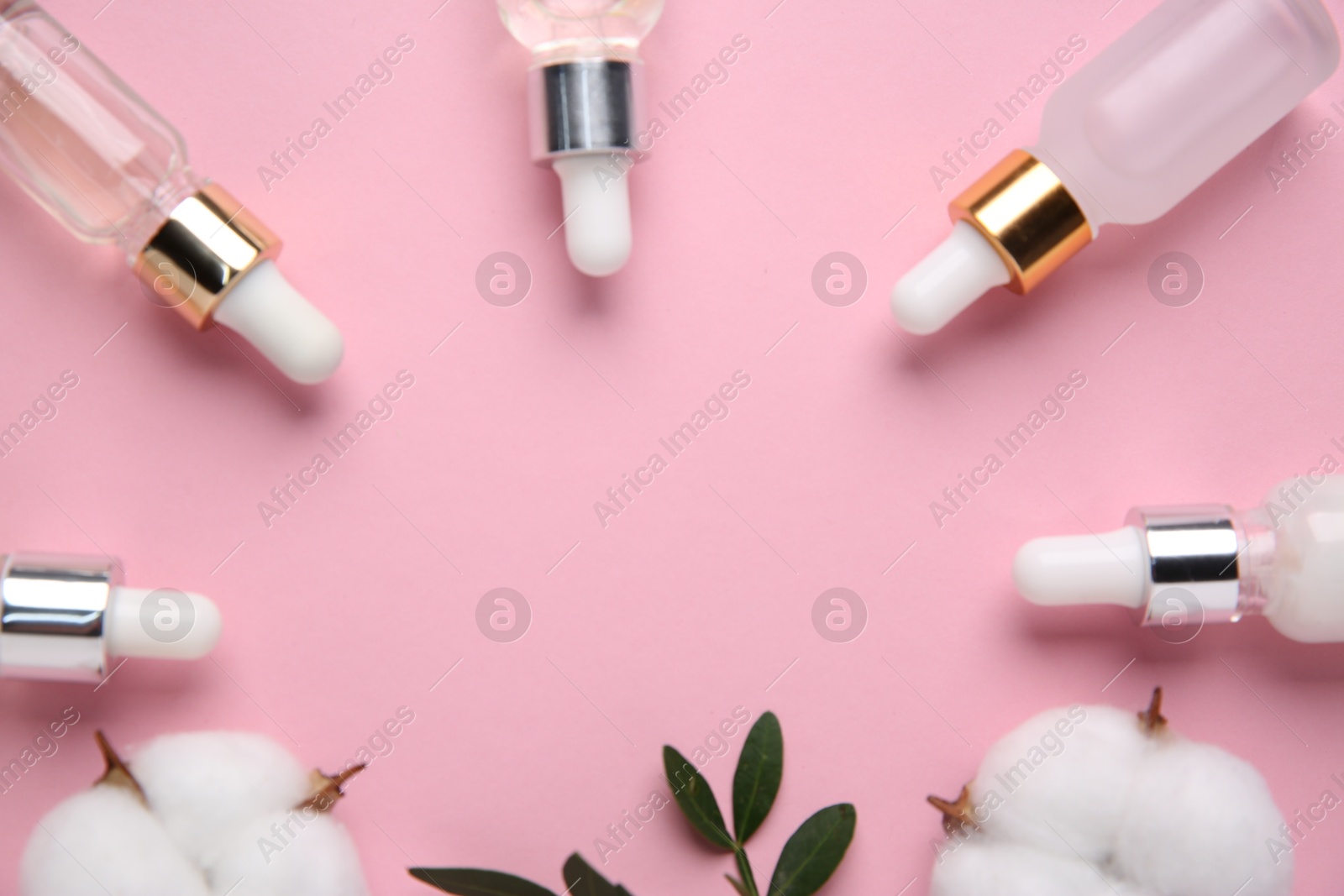 Photo of Different cosmetic products, leaves and cotton flowers on pink background, flat lay. Space for text