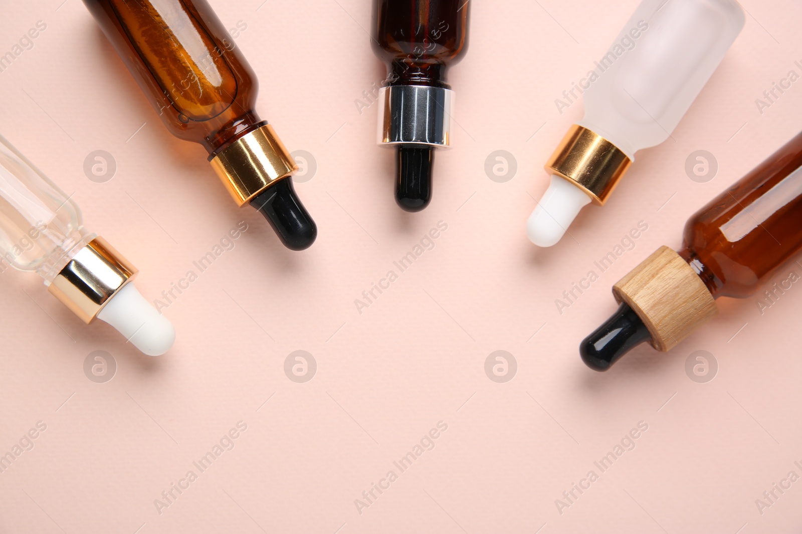 Photo of Different cosmetic products on beige background, flat lay. Space for text