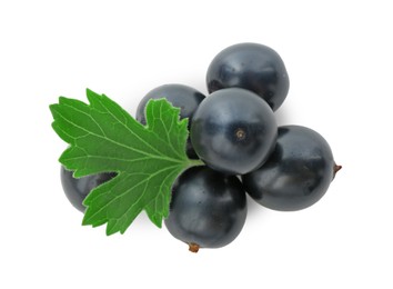 Photo of Ripe blackcurrants and green leaf isolated on white, top view