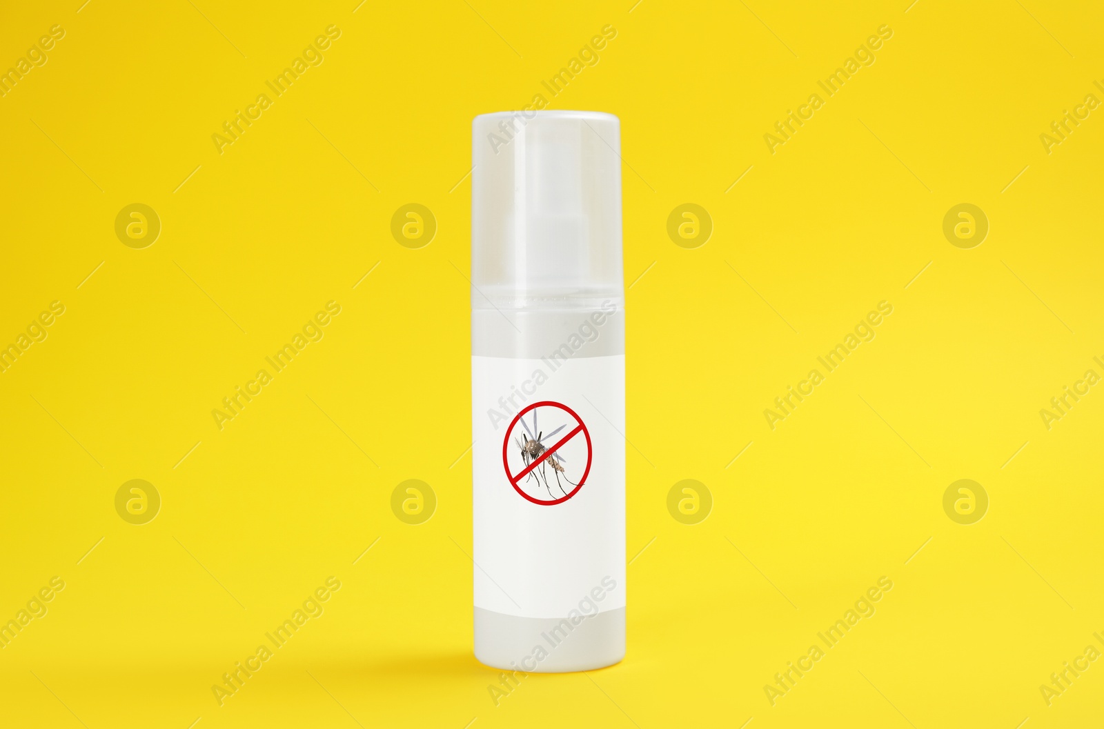 Image of Mosquito spray on yellow background. Insect repellent