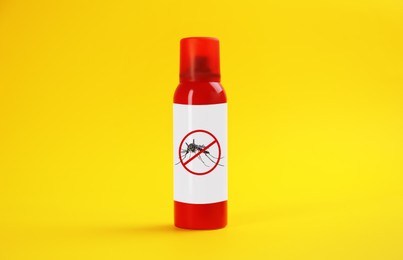 Mosquito spray on yellow background. Insect repellent