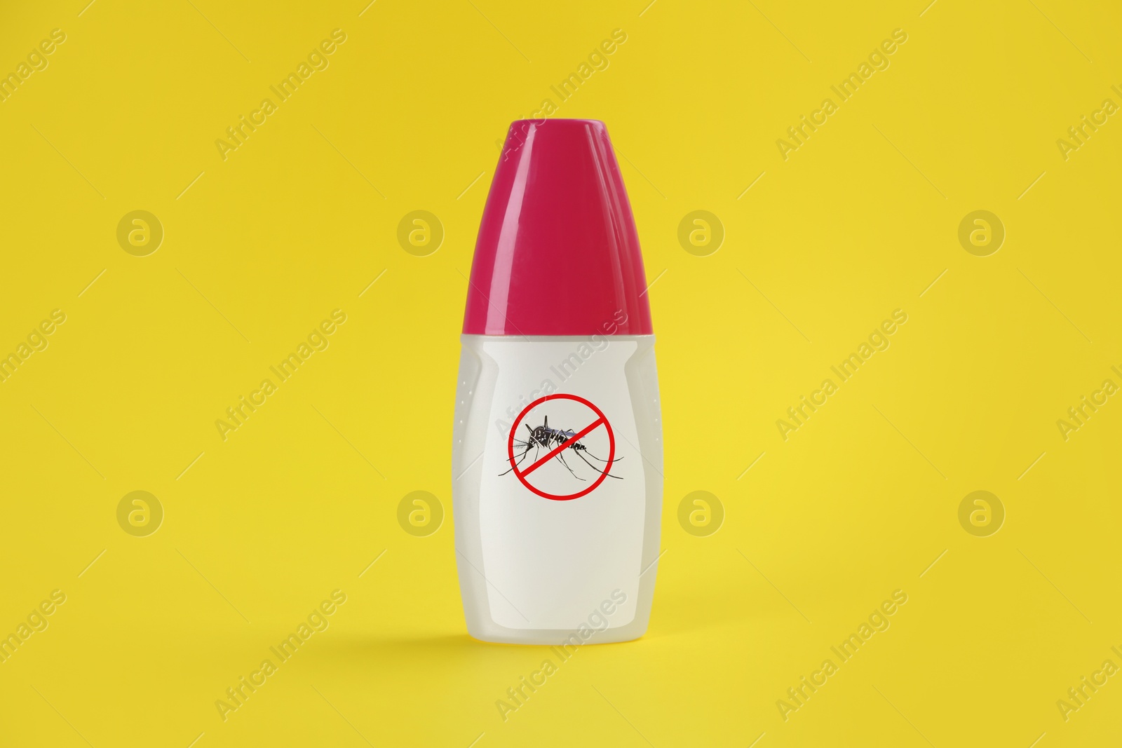 Image of Mosquito spray on yellow background. Insect repellent