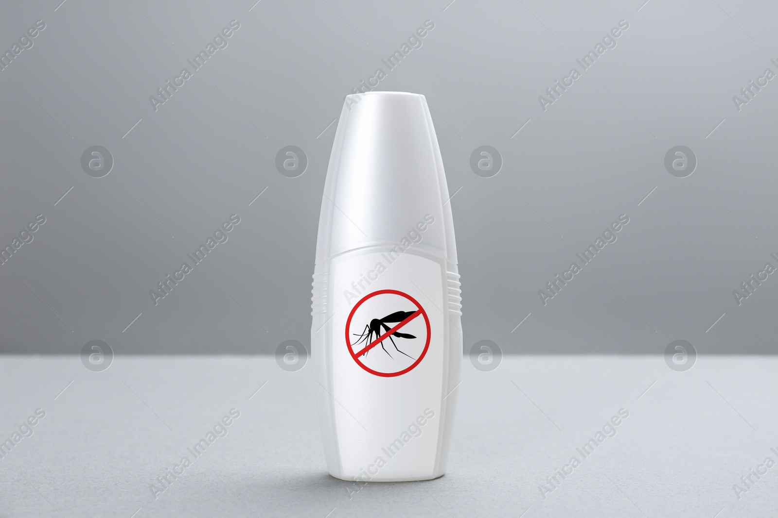 Image of Mosquito spray on grey background. Insect repellent