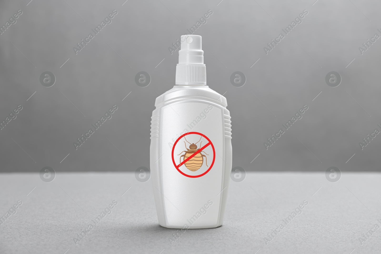 Image of Insect repellent in spray bottle on grey background