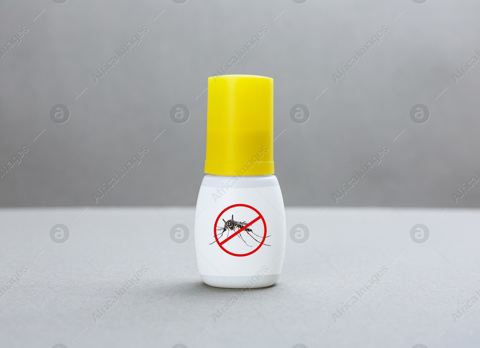 Image of Mosquito spray on grey background. Insect repellent