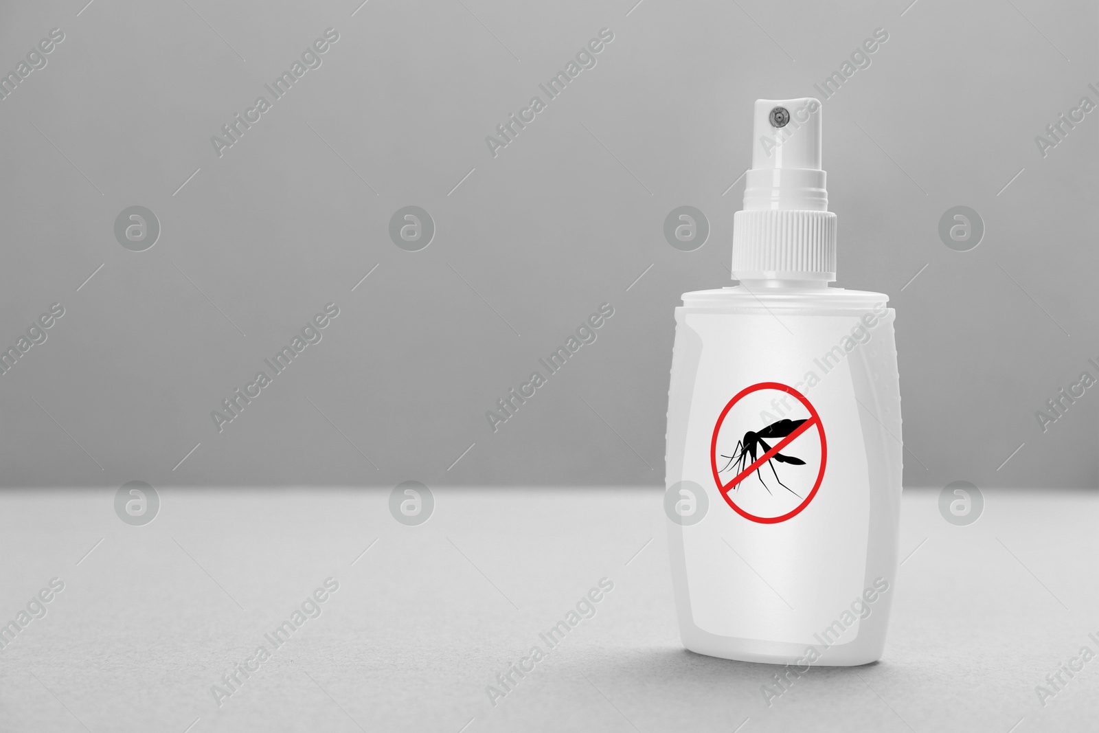 Image of Mosquito spray on grey background, space for text. Insect repellent