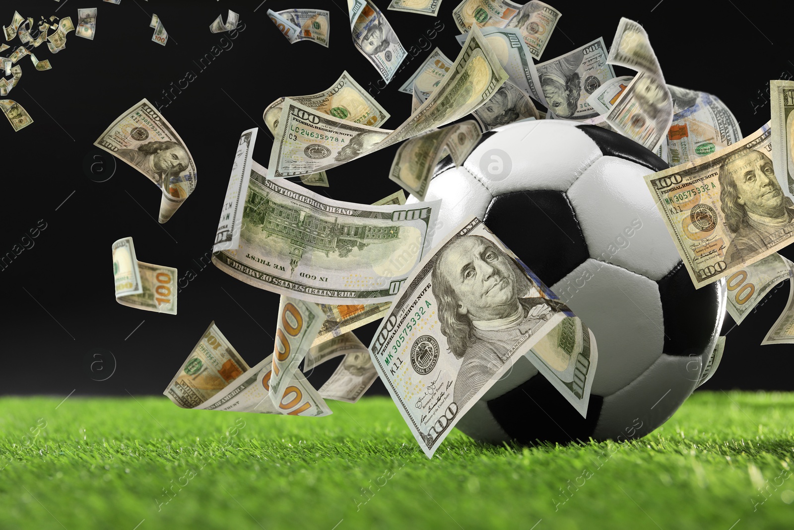 Image of Money flying from soccer ball on stadium