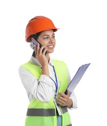 Photo of Engineer in hard hat with clipboard talking on smartphone against white background