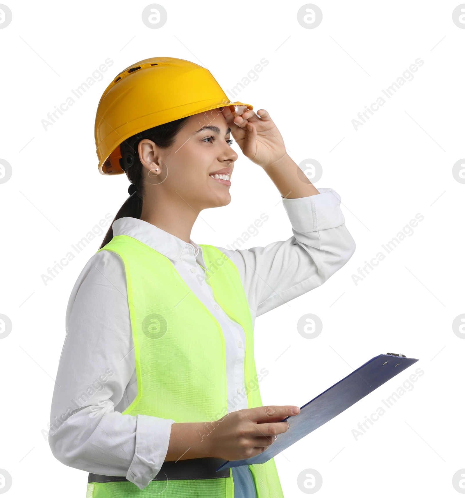 Photo of Engineer in hard hat with clipboard on white background