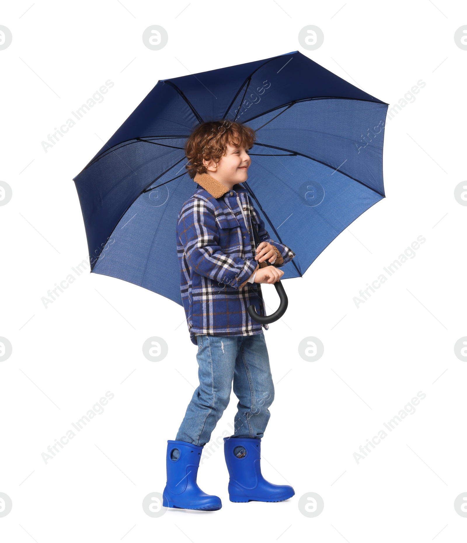 Photo of Little boy with blue umbrella on white background