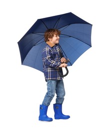 Photo of Little boy with blue umbrella on white background