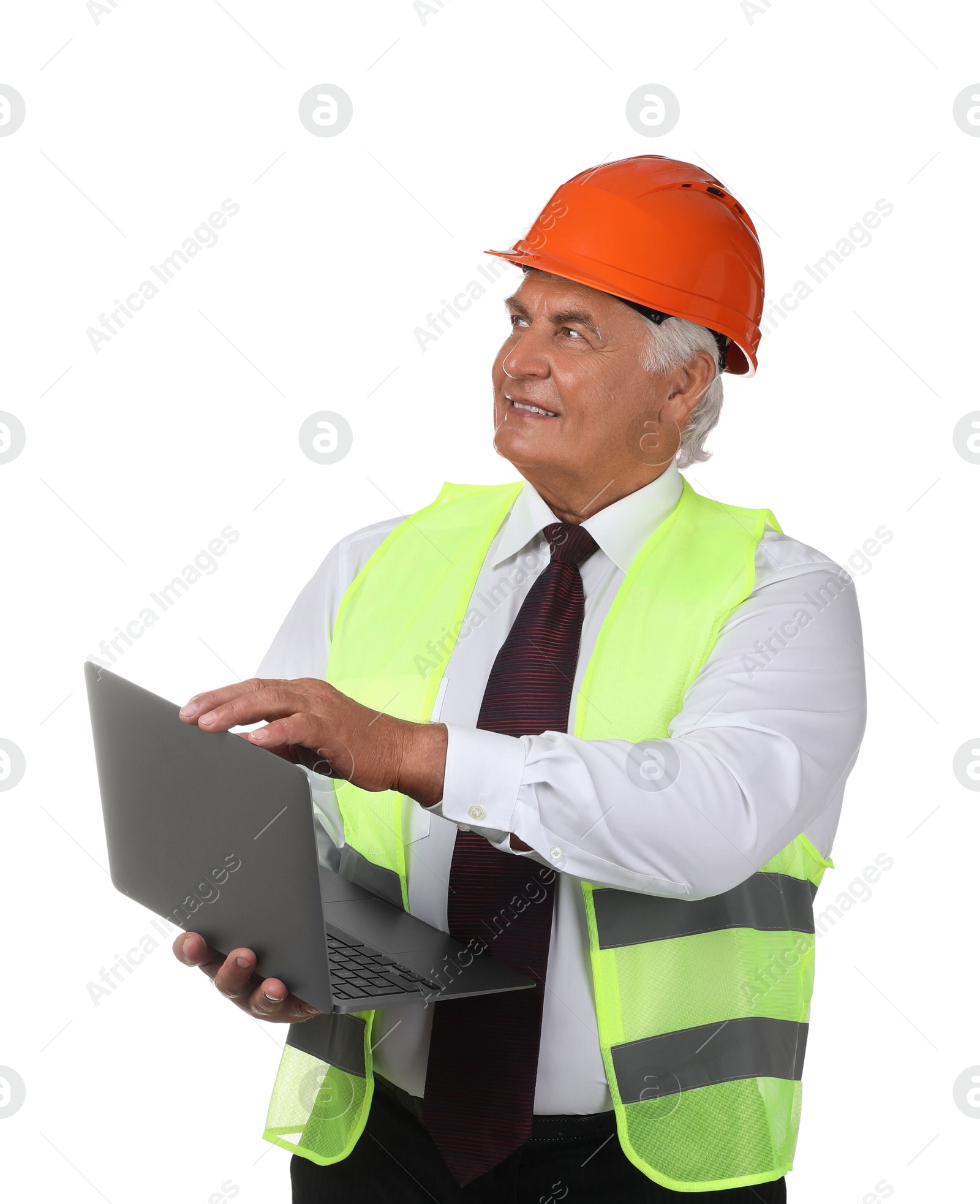 Photo of Engineer in hard hat with laptop on white background