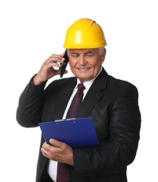 Engineer in hard hat with clipboard talking on smartphone against white background