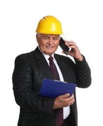 Engineer in hard hat with clipboard talking on smartphone against white background