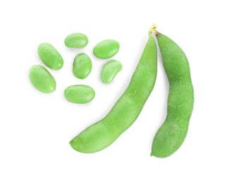 Photo of Raw green edamame soybeans and pods isolated on white, top view