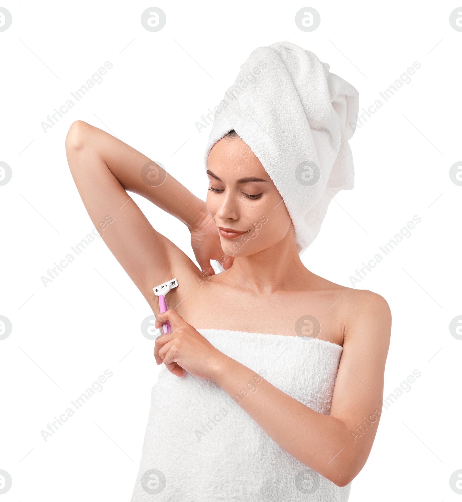 Photo of Beautiful woman shaving armpit on white background