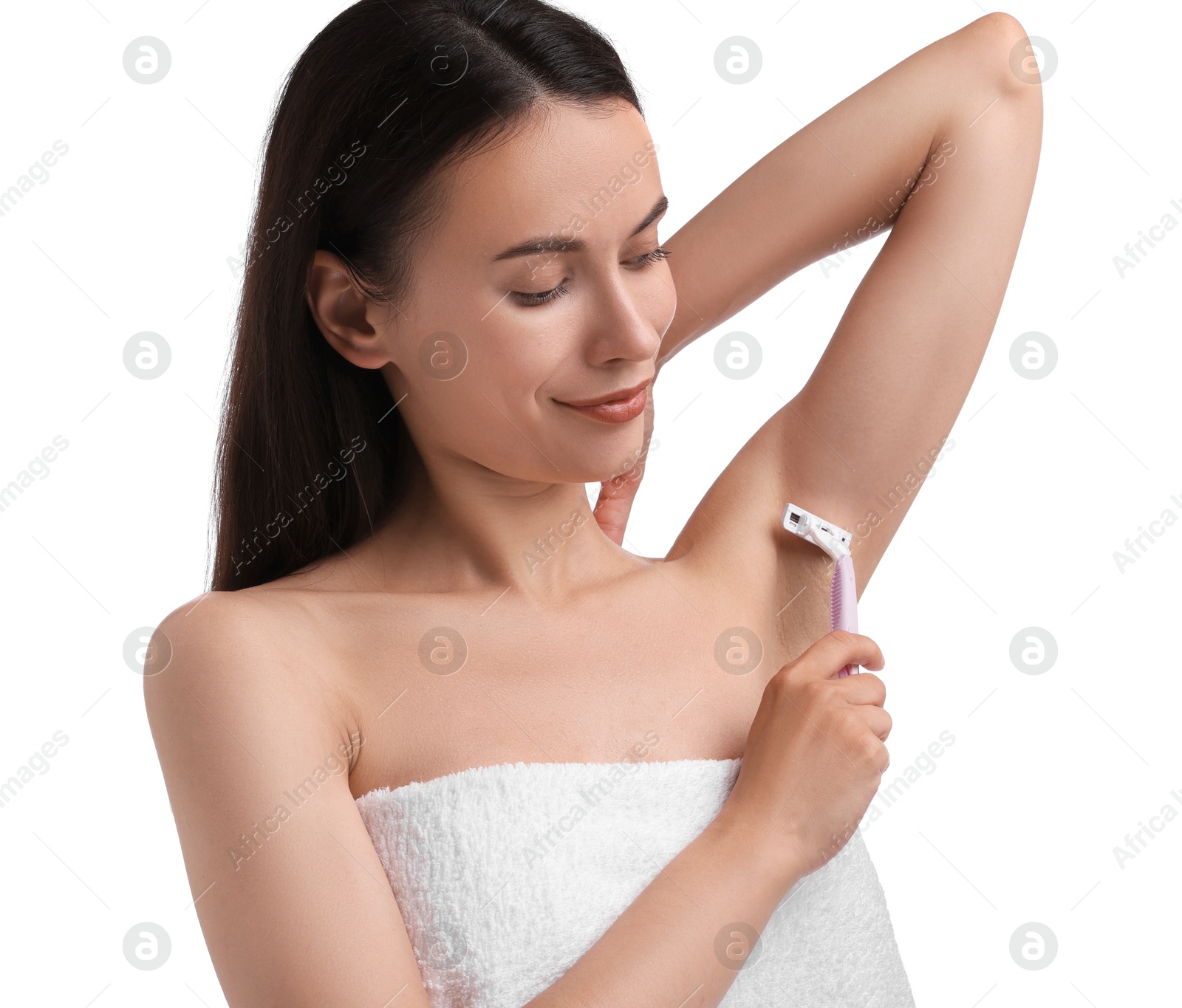 Photo of Beautiful woman shaving armpit on white background