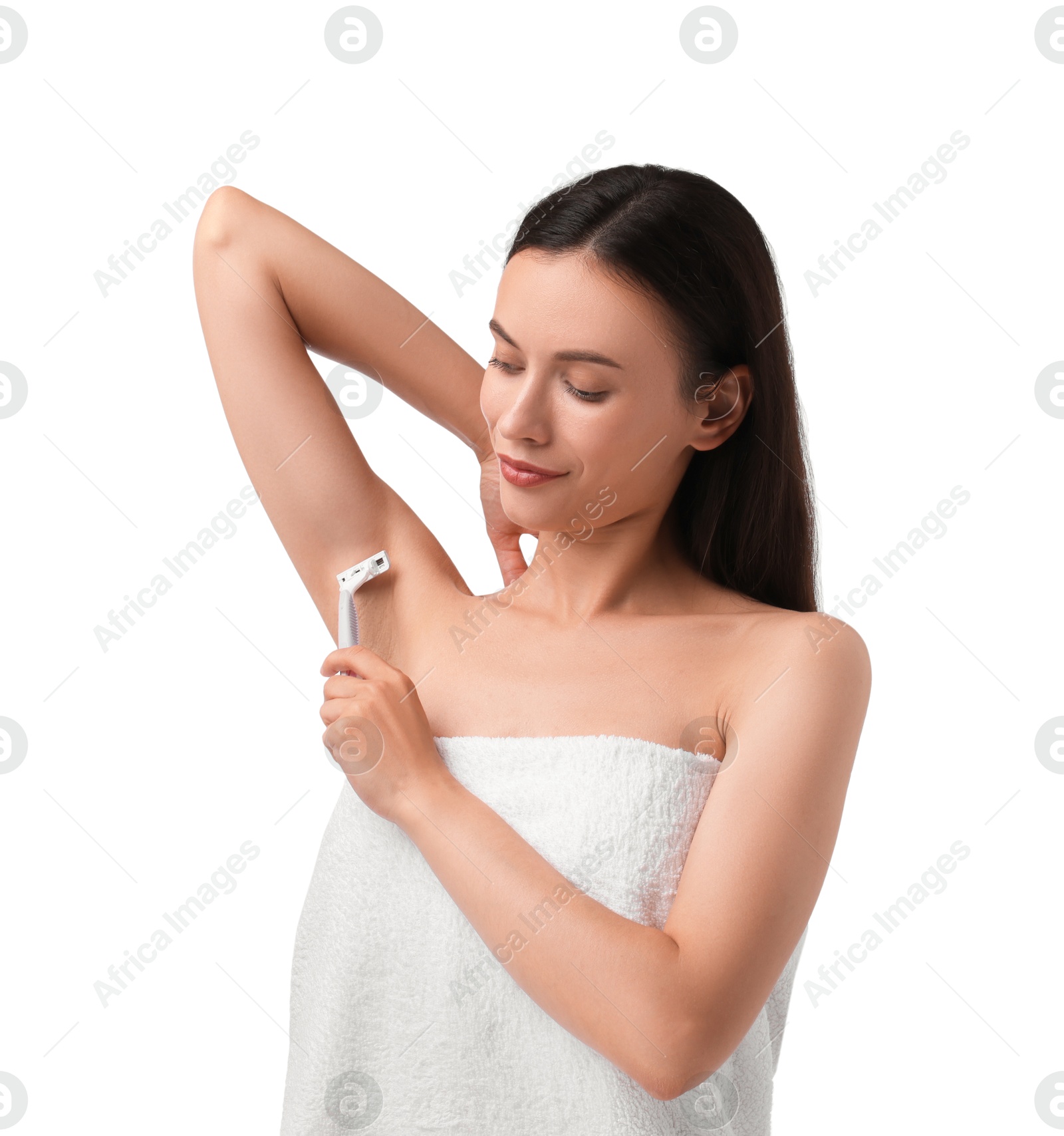 Photo of Beautiful woman shaving armpit on white background