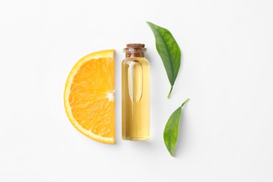 Photo of Bottle of essential oil, orange and green leaves on white background, flat lay