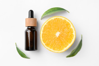 Photo of Bottle of essential oil, orange and green leaves on white background, flat lay