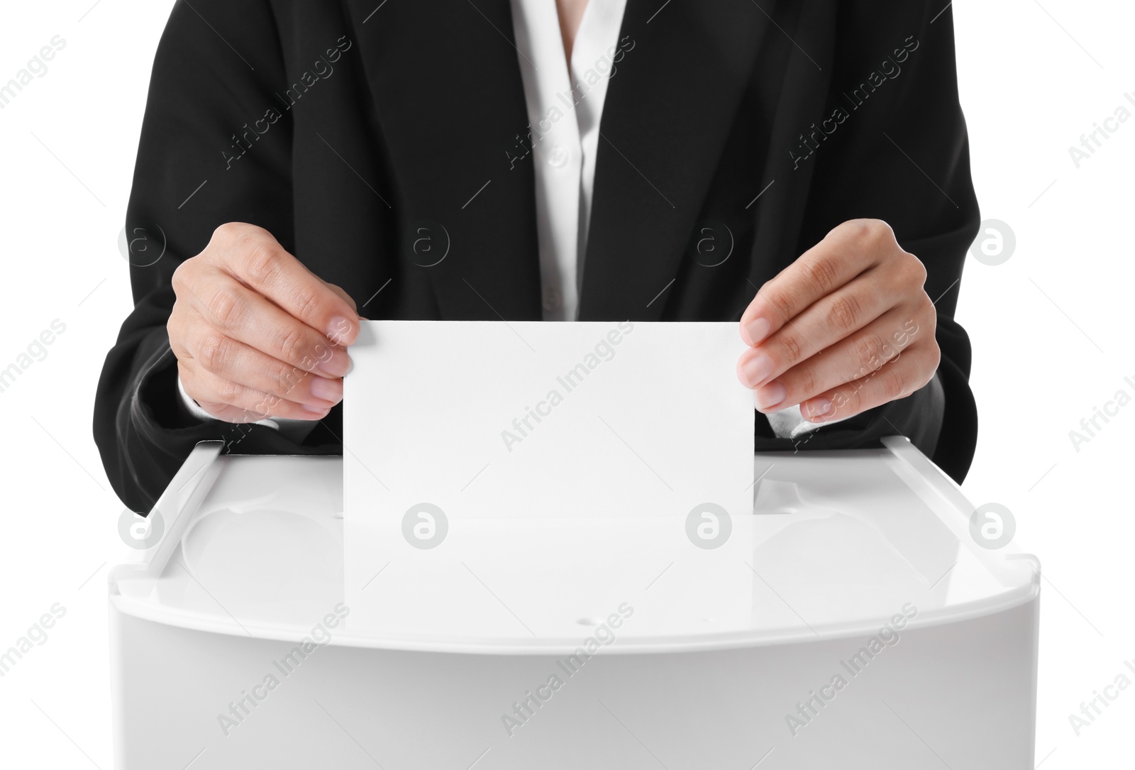 Photo of Woman putting her vote into ballot box against white background, closeup