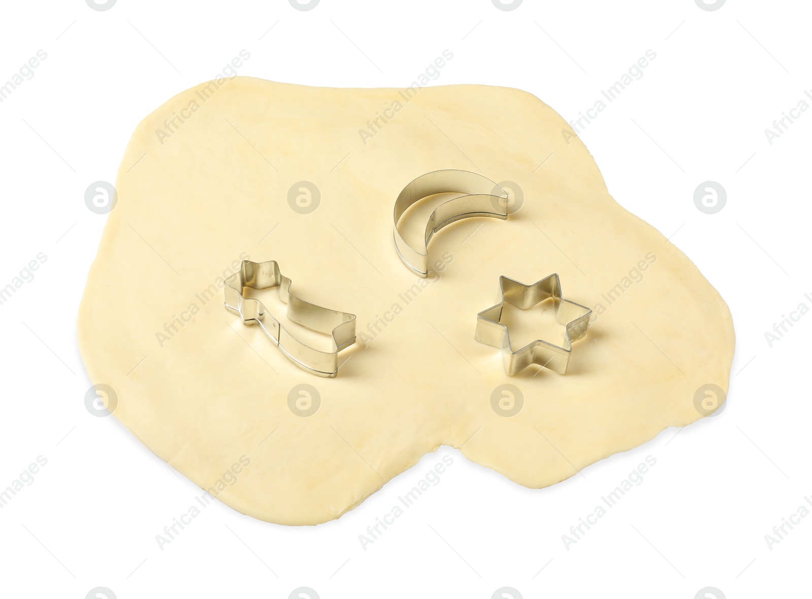 Photo of Raw dough and cookie cutters isolated on white