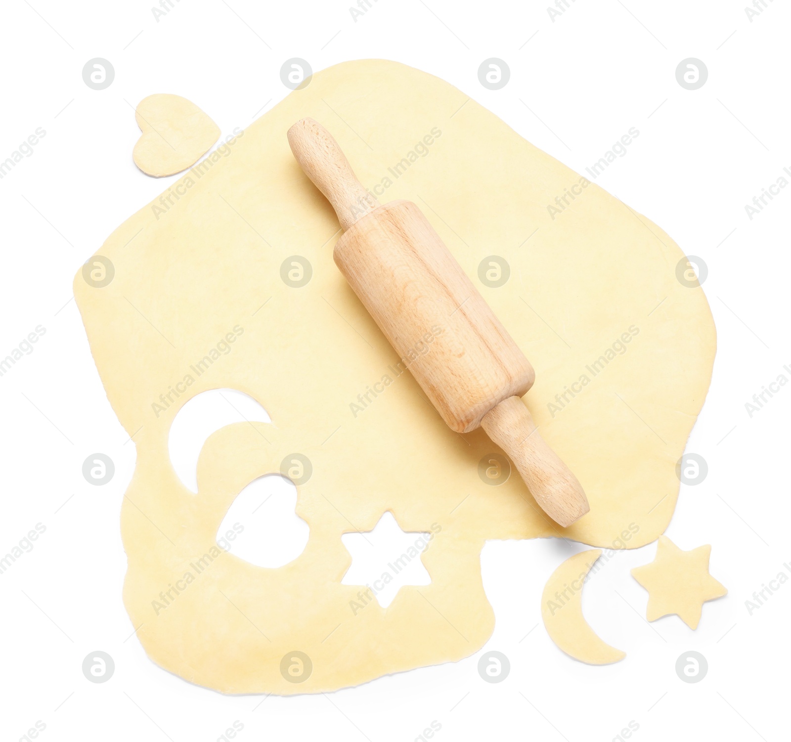 Photo of Raw dough and wooden rolling pin isolated on white, top view