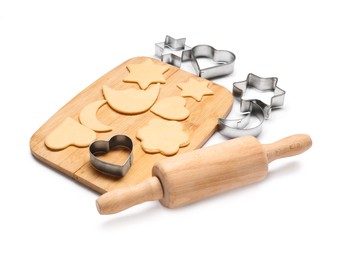 Photo of Raw dough, wooden rolling pin and cookie cutters isolated on white