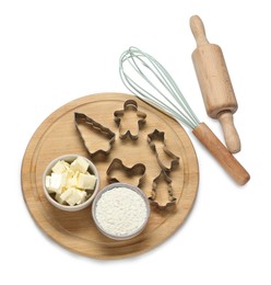 Photo of Flour, butter, cookie cutters, whisk and rolling pin isolated on white, above view