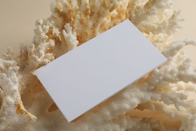 Photo of Blank business card on beige background. Mockup for design