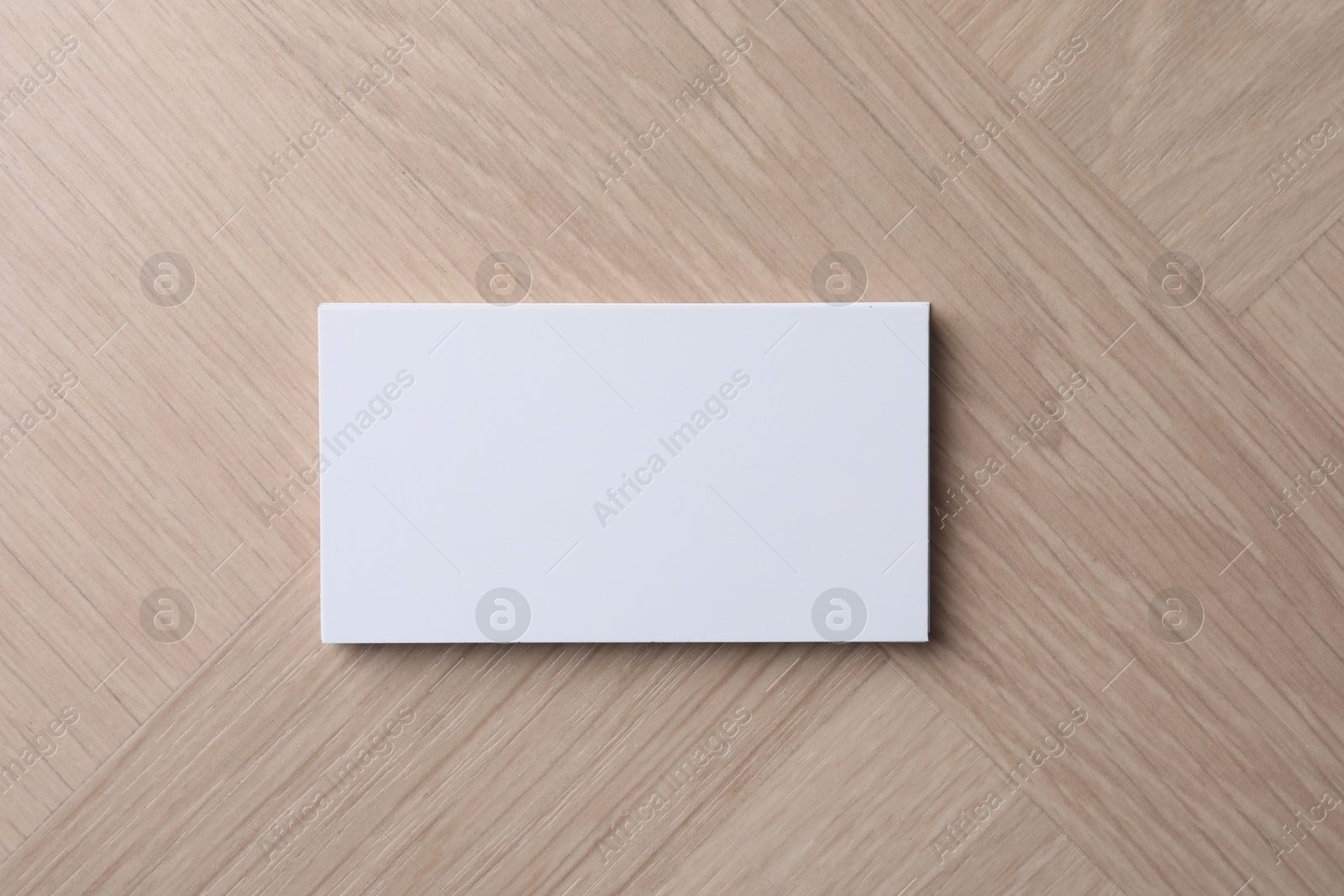 Photo of Blank business cards on wooden table, top view. Mockup for design