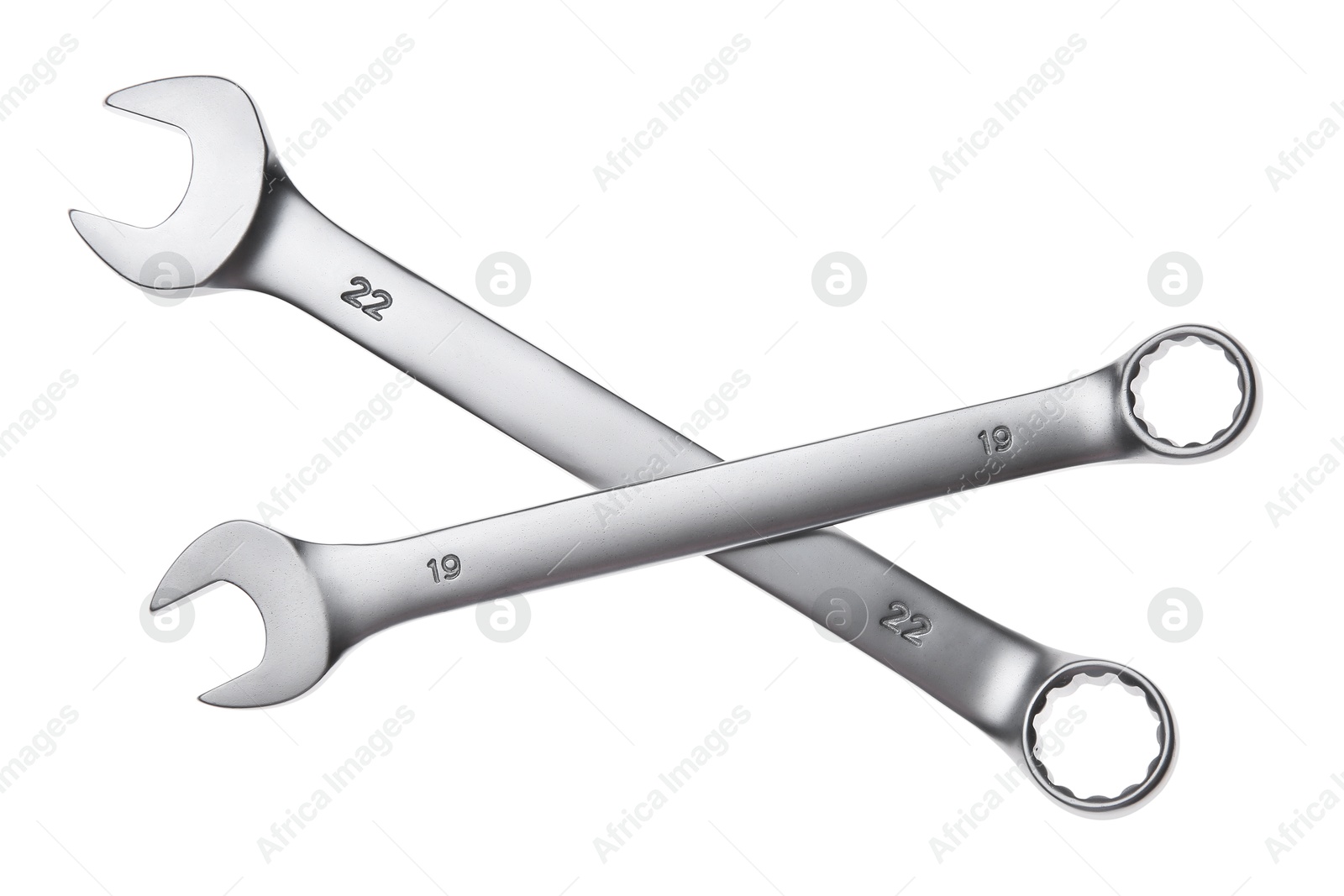 Photo of Two ratcheting wrenches isolated on white, top view. Auto mechanic tools