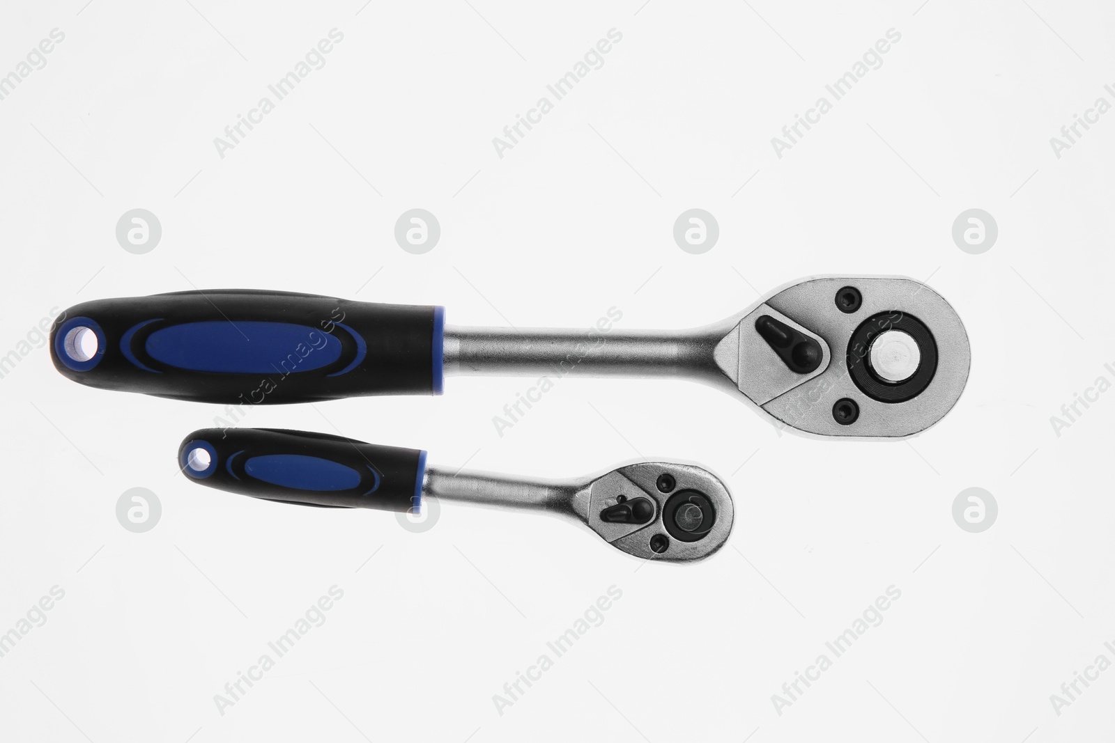 Photo of Two torque wrenches on white background, top view. Auto mechanic tools