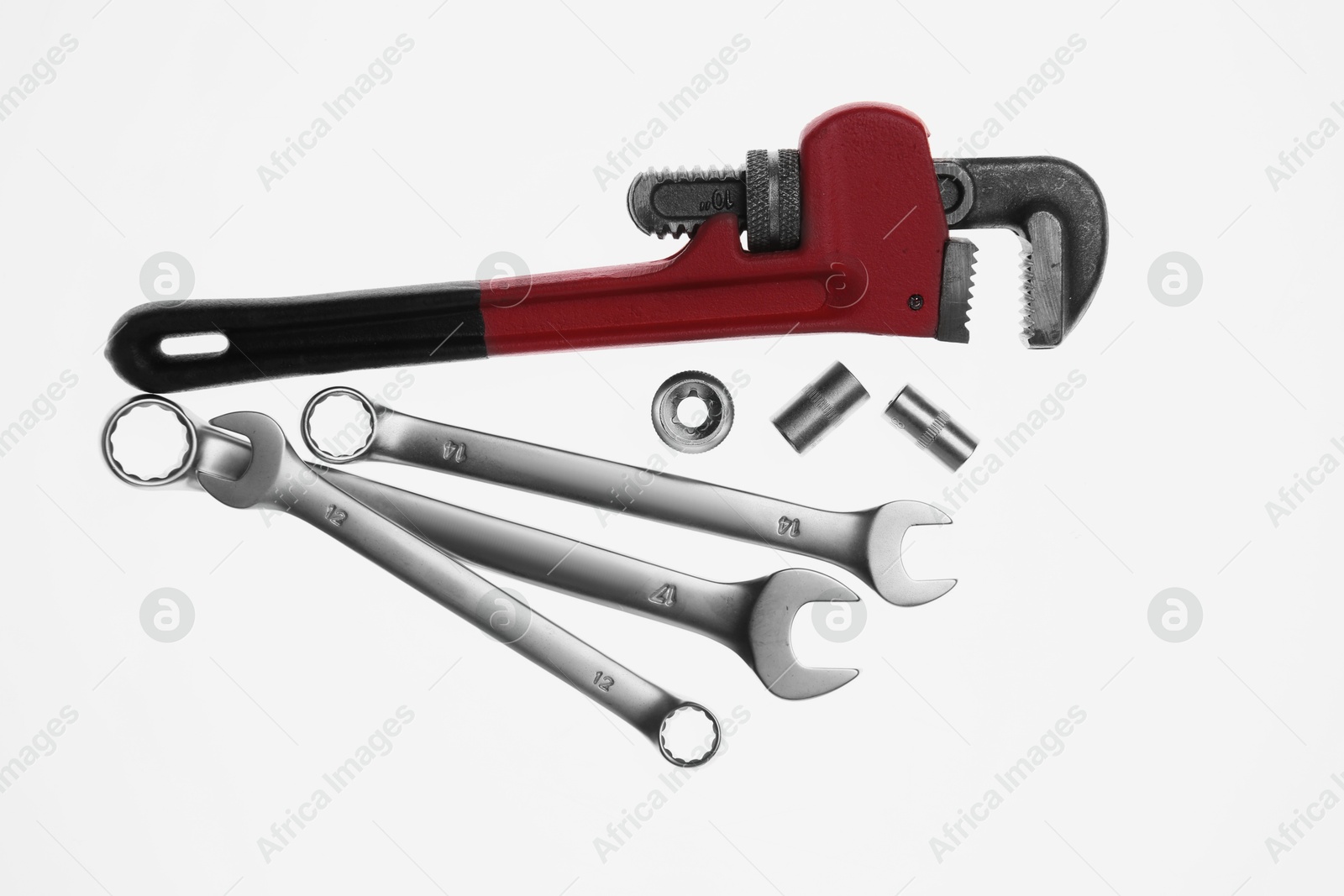 Photo of Set of auto mechanic's tools on white background, flat lay