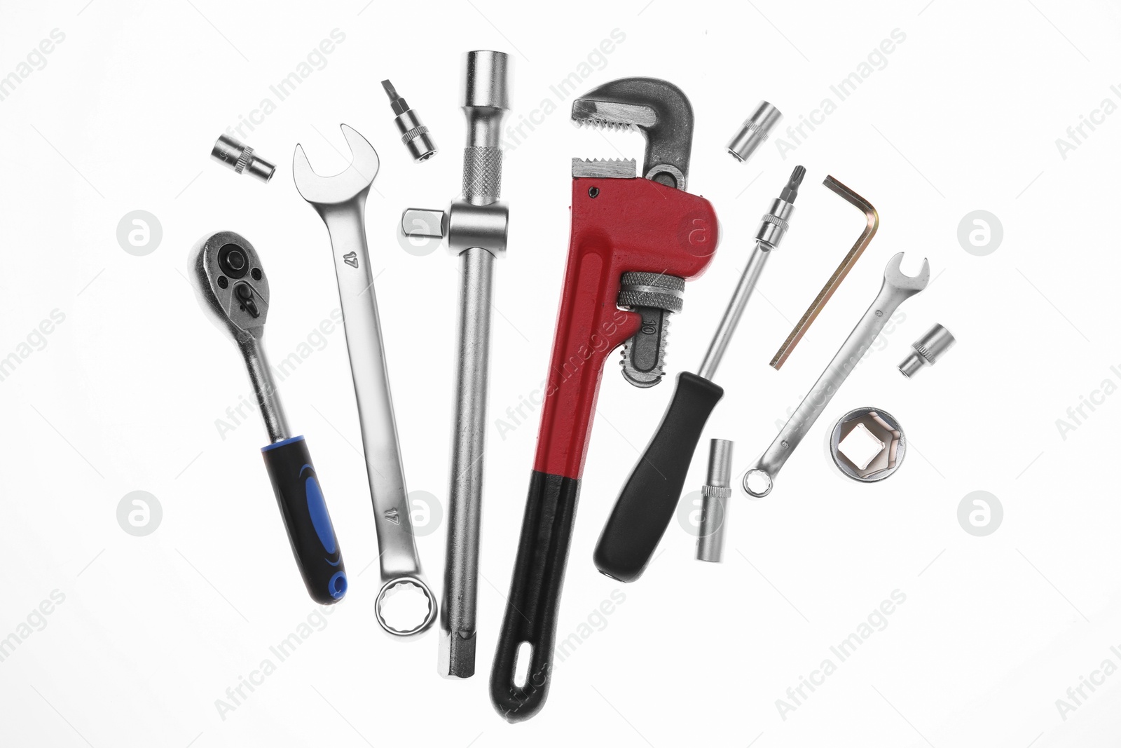 Photo of Set of auto mechanic's tools on white background, flat lay