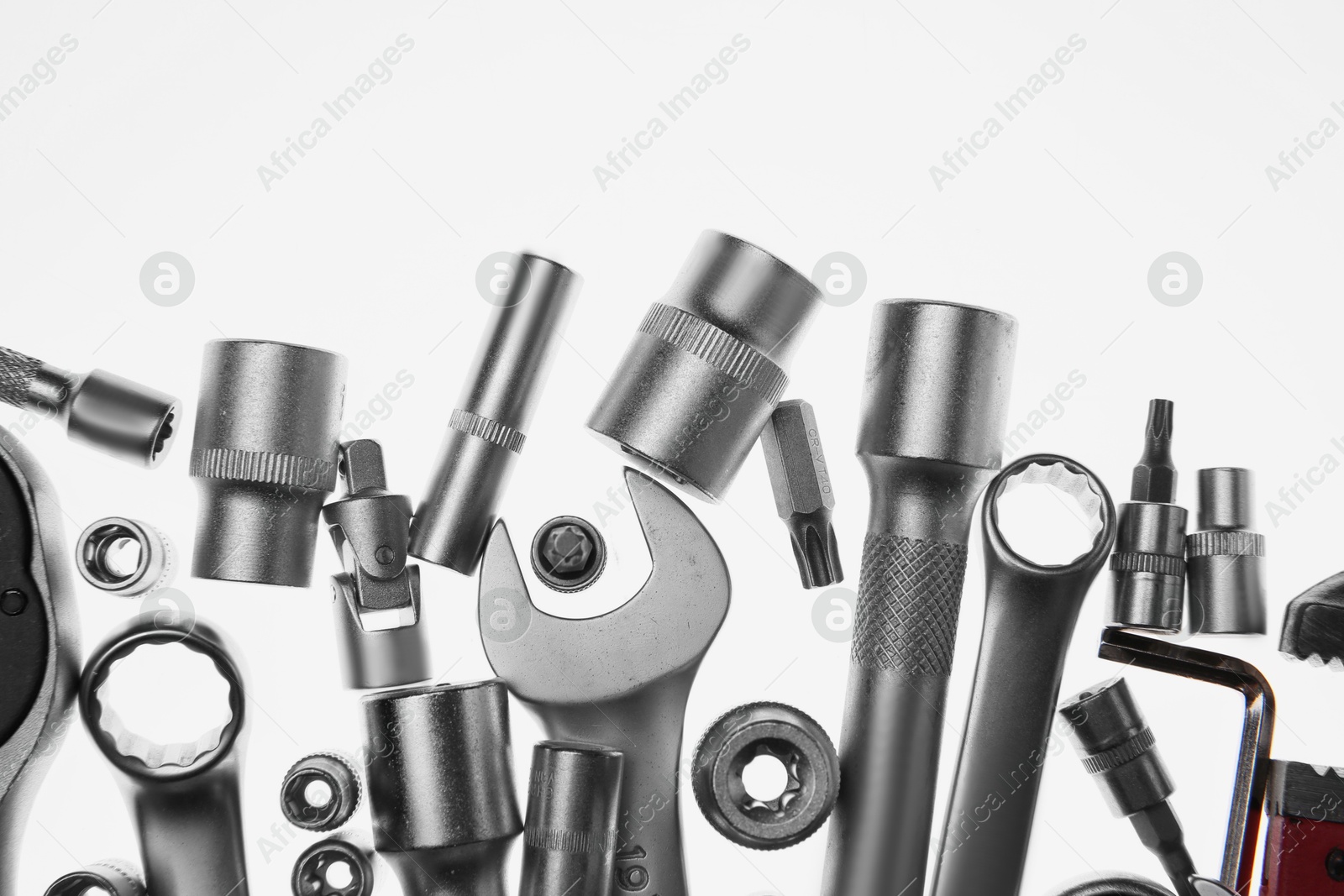 Photo of Set of auto mechanic's tools on white background, flat lay