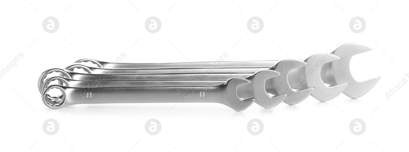 Photo of Set of ratcheting wrenches isolated on white. Auto mechanic tools