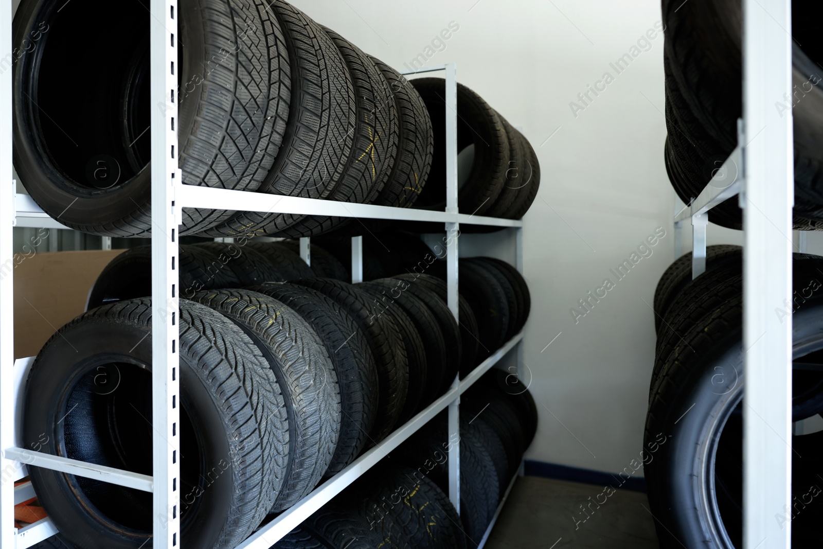 Photo of Group of car tires in auto store