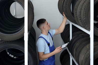 Photo of Young man with clipboard near car tires in auto store