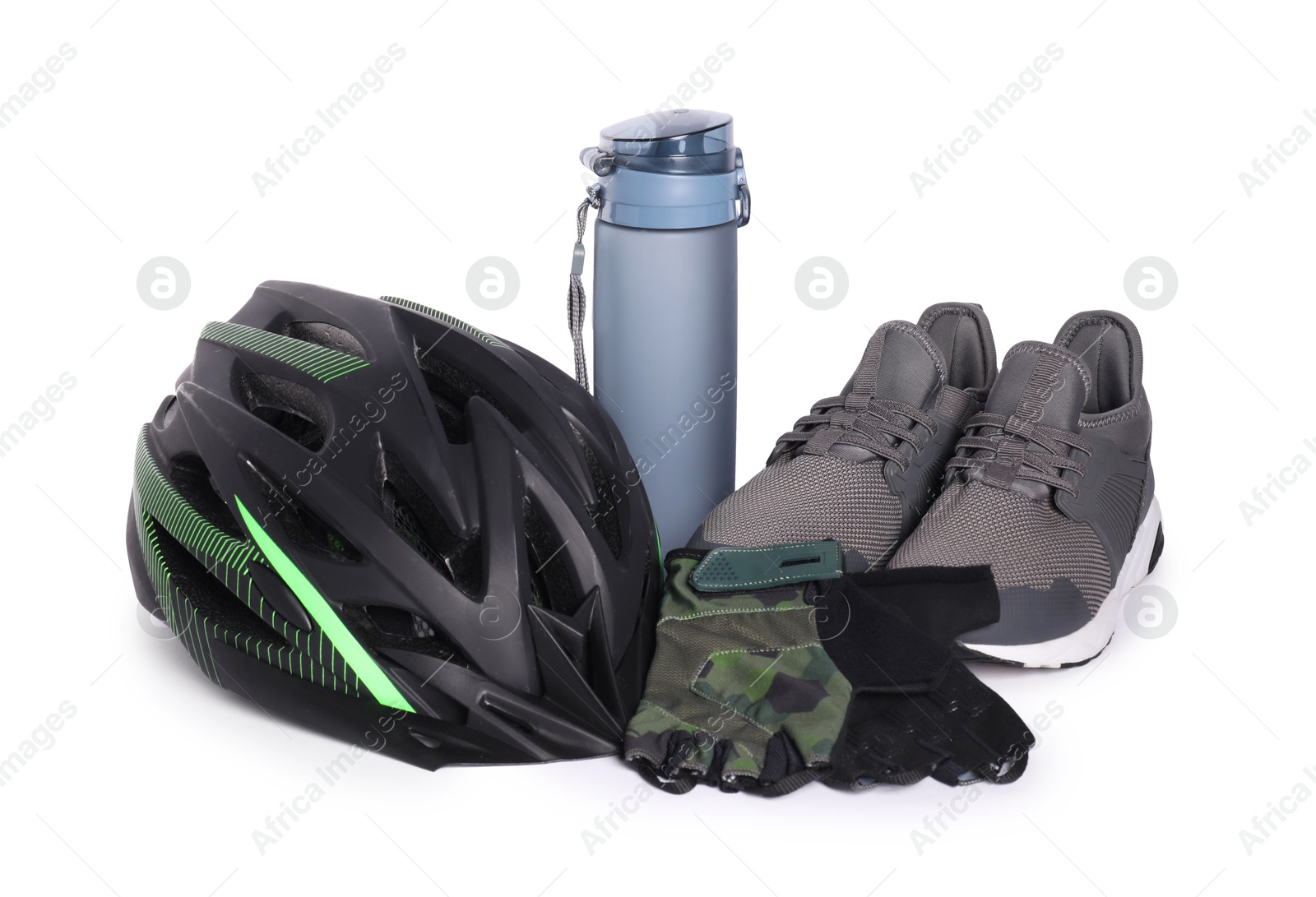 Photo of Bicycle helmet, sneakers, thermo bottle and fingerless gloves isolated on white