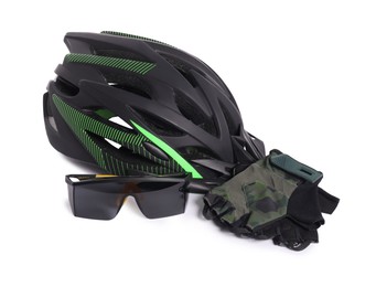 Bicycle helmet, goggles and fingerless gloves isolated on white