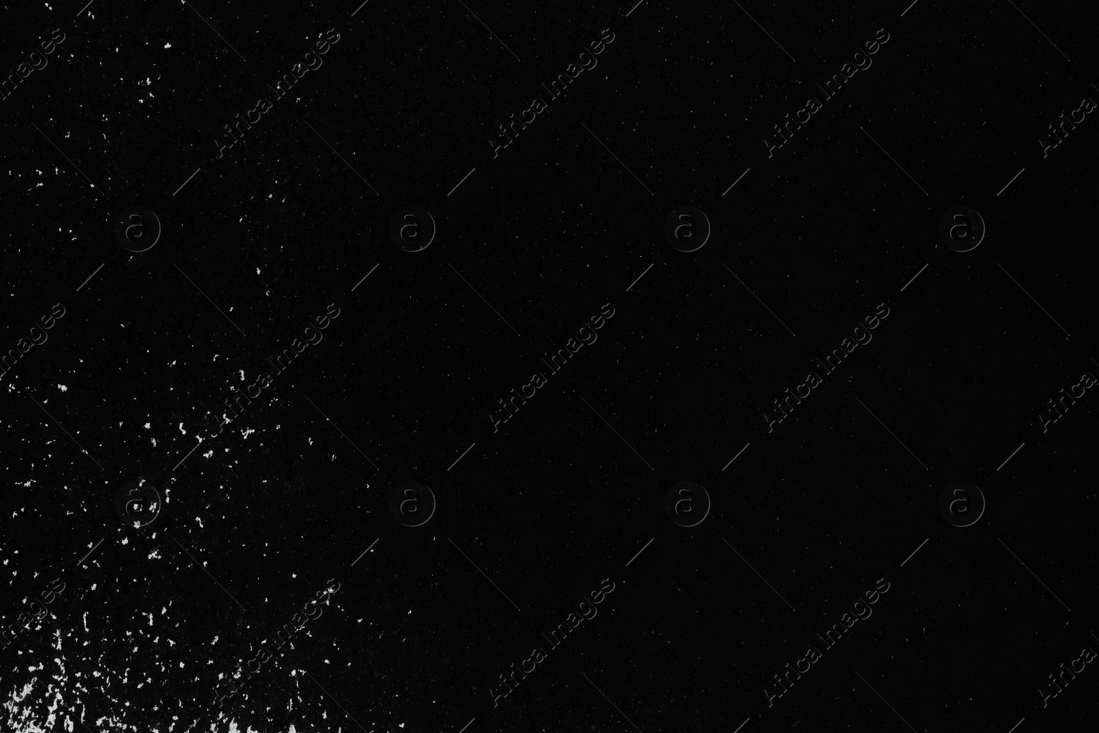 Photo of Texture of paper with black ink as background, top view